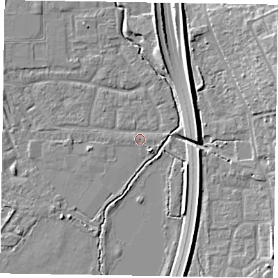 Shaded relief map of the ground around GU124AT, computed from Environment Agency LiDAR. The ground here sits at about 71 m above sea level and falls 12 m across the surrounding 800 m. Surface water reaching this point runs off ground lying to the east-south-east, 0.5 m higher.