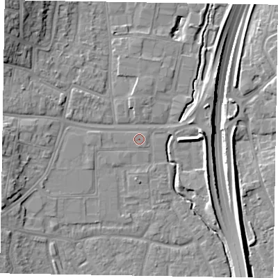Shaded relief map of the ground around GU124DQ, computed from Environment Agency LiDAR. The ground here sits at about 71 m above sea level and falls 17 m across the surrounding 800 m. Surface water reaching this point runs off ground lying to the west, 5.4 m higher.