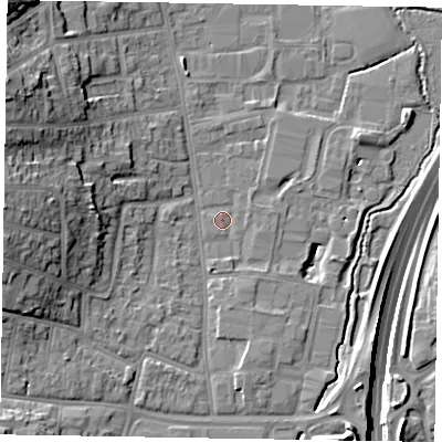 Shaded relief map of the ground around GU124QP, computed from Environment Agency LiDAR. The ground here sits at about 70 m above sea level and falls 22 m across the surrounding 800 m. Surface water reaching this point runs off ground lying to the west, 12.4 m higher.