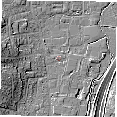 Shaded relief map of the ground around GU124RG, computed from Environment Agency LiDAR. The ground here sits at about 70 m above sea level and falls 19 m across the surrounding 800 m. Surface water reaching this point runs off ground lying to the west, 13.3 m higher.