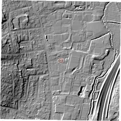 Shaded relief map of the ground around GU124UB, computed from Environment Agency LiDAR. The ground here sits at about 70 m above sea level and falls 20 m across the surrounding 800 m. Surface water reaching this point runs off ground lying to the west, 13.3 m higher.