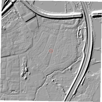 Shaded relief map of the ground around GU124UJ, computed from Environment Agency LiDAR. The ground here sits at about 70 m above sea level and falls 13 m across the surrounding 800 m. Surface water reaching this point runs off ground lying to the west-south-west, 0.8 m higher.