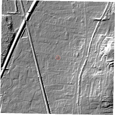 Shaded relief map of the ground around GU125JF, computed from Environment Agency LiDAR. The ground here sits at about 69 m above sea level and falls 26 m across the surrounding 800 m. Surface water reaching this point runs off ground lying to the east, 22.4 m higher.
