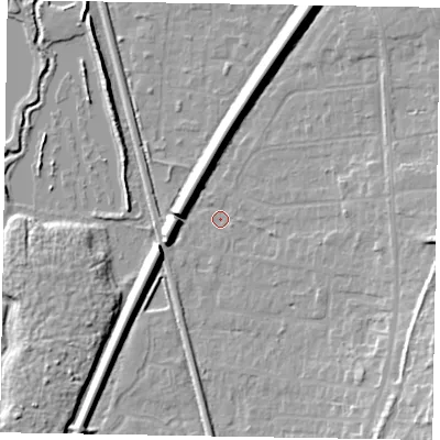 Shaded relief map of the ground around GU125JS, computed from Environment Agency LiDAR. The ground here sits at about 67 m above sea level and falls 13 m across the surrounding 800 m. Surface water reaching this point runs off ground lying to the south-east, 12.3 m higher.