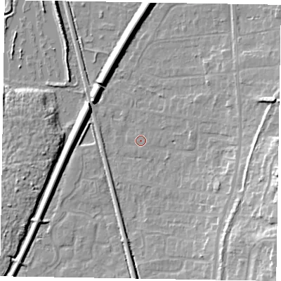 Shaded relief map of the ground around GU125JW, computed from Environment Agency LiDAR. The ground here sits at about 68 m above sea level and falls 16 m across the surrounding 800 m. Surface water reaching this point runs off ground lying to the east, 12.1 m higher.