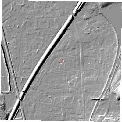 Shaded relief map of the ground around GU125LQ, computed from Environment Agency LiDAR. The ground here sits at about 68 m above sea level and falls 19 m across the surrounding 800 m. Surface water reaching this point runs off ground lying to the north-east, 2.8 m higher.