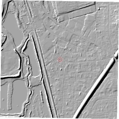 Shaded relief map of the ground around GU125ND, computed from Environment Agency LiDAR. The ground here sits at about 67 m above sea level and falls 12 m across the surrounding 800 m. Surface water reaching this point runs off ground lying to the east, 10.2 m higher.