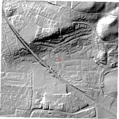 Shaded relief map of the ground around GU126AW, computed from Environment Agency LiDAR. The ground here sits at about 74 m above sea level and falls 32 m across the surrounding 800 m. Surface water reaching this point runs off ground lying to the south, 11.8 m higher.