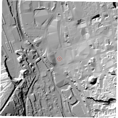 Shaded relief map of the ground around GU13EG, computed from Environment Agency LiDAR. The ground here sits at about 33 m above sea level and falls 55 m across the surrounding 800 m. Surface water reaching this point runs off ground lying to the east, 14.4 m higher.