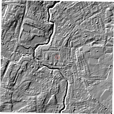 Shaded relief map of the ground around GU148QE, computed from Environment Agency LiDAR. The ground here sits at about 61 m above sea level and falls 6 m across the surrounding 800 m. Surface water reaching this point runs off ground lying to the north-east, 0.6 m higher.