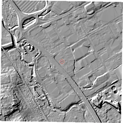 Shaded relief map of the ground around GU153DL, computed from Environment Agency LiDAR. The ground here sits at about 60 m above sea level and falls 13 m across the surrounding 800 m. The ground contributing surface water to this point lies to the south-east.