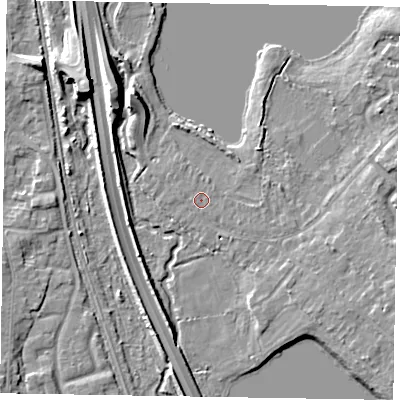 Shaded relief map of the ground around GU166DS, computed from Environment Agency LiDAR. The ground here sits at about 65 m above sea level and falls 9 m across the surrounding 800 m. Surface water reaching this point runs off ground lying to the east, 0.9 m higher.