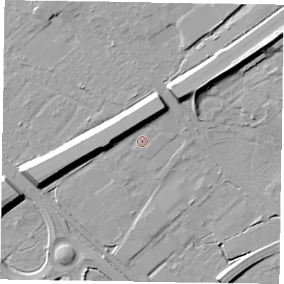 Shaded relief map of the ground around GU167QE, computed from Environment Agency LiDAR. The ground here sits at about 63 m above sea level and falls 16 m across the surrounding 800 m. Surface water reaching this point runs off ground lying to the north-north-east, 8.7 m higher.