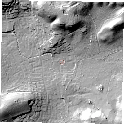 Shaded relief map of the ground around GU169UW, computed from Environment Agency LiDAR. The ground here sits at about 77 m above sea level and falls 34 m across the surrounding 800 m. Surface water reaching this point runs off ground lying to the north-east, 28.5 m higher.