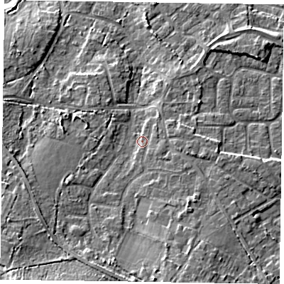 Shaded relief map of the ground around GU170BY, computed from Environment Agency LiDAR. The ground here sits at about 62 m above sea level and falls 16 m across the surrounding 800 m. Surface water reaching this point runs off ground lying to the south-east, 1.6 m higher.