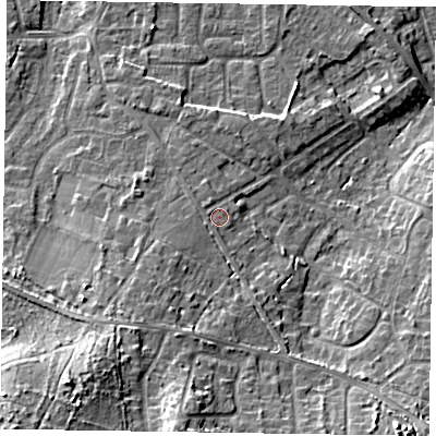 Shaded relief map of the ground around GU170NP, computed from Environment Agency LiDAR. The ground here sits at about 64 m above sea level and falls 19 m across the surrounding 800 m. Surface water reaching this point runs off ground lying to the south-west, 12.2 m higher.