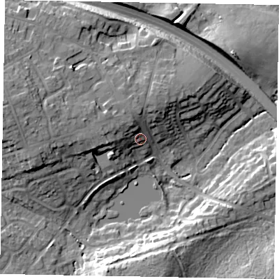 Shaded relief map of the ground around GU185RZ, computed from Environment Agency LiDAR. The ground here sits at about 52 m above sea level and falls 21 m across the surrounding 800 m. Surface water reaching this point runs off ground lying to the west, 7.6 m higher.