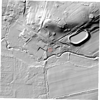 Shaded relief map of the ground around GU228JE, computed from Environment Agency LiDAR. The ground here sits at about 24 m above sea level and falls 29 m across the surrounding 800 m. Surface water reaching this point runs off ground lying to the north, 7.1 m higher.