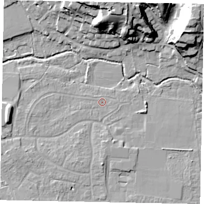 Shaded relief map of the ground around GU229AJ, computed from Environment Agency LiDAR. The ground here sits at about 24 m above sea level and falls 22 m across the surrounding 800 m. Surface water reaching this point runs off ground lying to the west, 5.1 m higher.
