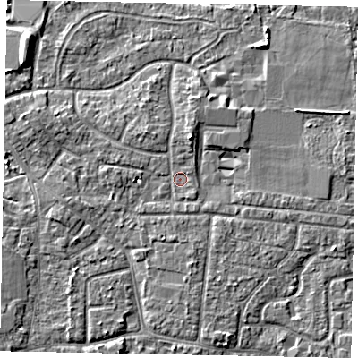 Shaded relief map of the ground around GU229AT, computed from Environment Agency LiDAR. The ground here sits at about 24 m above sea level and falls 7 m across the surrounding 800 m. Surface water reaching this point runs off ground lying to the north-north-east, 3.0 m higher.
