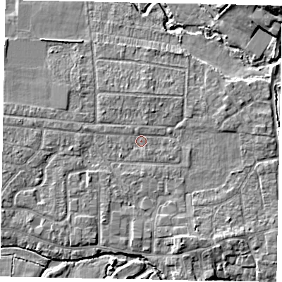 Shaded relief map of the ground around GU229DQ, computed from Environment Agency LiDAR. The ground here sits at about 24 m above sea level and falls 10 m across the surrounding 800 m. Surface water reaching this point runs off ground lying to the north-west, 1.0 m higher.