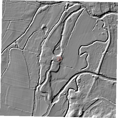 Shaded relief map of the ground around GU229DR, computed from Environment Agency LiDAR. The ground here sits at about 24 m above sea level and falls 7 m across the surrounding 800 m. Surface water reaching this point runs off ground lying to the south-west, 1.0 m higher.