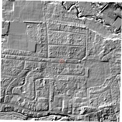 Shaded relief map of the ground around GU229FA, computed from Environment Agency LiDAR. The ground here sits at about 24 m above sea level and falls 10 m across the surrounding 800 m. Surface water reaching this point runs off ground lying to the north-west, 1.2 m higher.