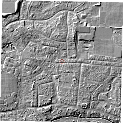 Shaded relief map of the ground around GU229FZ, computed from Environment Agency LiDAR. The ground here sits at about 24 m above sea level and falls 7 m across the surrounding 800 m. Surface water reaching this point runs off ground lying to the south-east, 1.2 m higher.