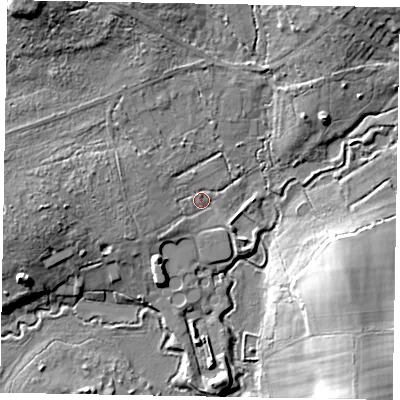 Shaded relief map of the ground around GU240DB, computed from Environment Agency LiDAR. The ground here sits at about 33 m above sea level and falls 17 m across the surrounding 800 m. Surface water reaching this point runs off ground lying to the west, 7.4 m higher.