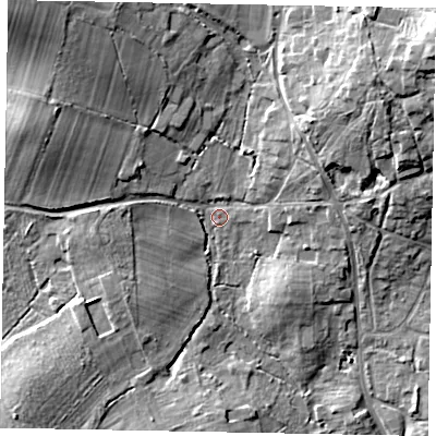 Shaded relief map of the ground around GU248SY, computed from Environment Agency LiDAR. The ground here sits at about 33 m above sea level and falls 16 m across the surrounding 800 m. Surface water reaching this point runs off ground lying to the north-west, 11.7 m higher.