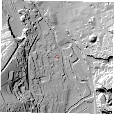 Shaded relief map of the ground around GU24BE, computed from Environment Agency LiDAR. The ground here sits at about 32 m above sea level and falls 69 m across the surrounding 800 m. Surface water reaching this point runs off ground lying to the west-south-west, 18.1 m higher.