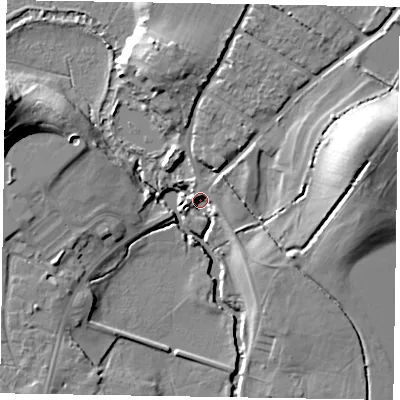 Shaded relief map of the ground around GU299AJ, computed from Environment Agency LiDAR. The ground here sits at about 19 m above sea level and falls 23 m across the surrounding 800 m. Surface water reaching this point runs off ground lying to the east-north-east, 20.1 m higher.