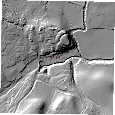 Shaded relief map of the ground around GU299PX, computed from Environment Agency LiDAR. The ground here sits at about 21 m above sea level and falls 31 m across the surrounding 800 m. Surface water reaching this point runs off ground lying to the north, 18.6 m higher.