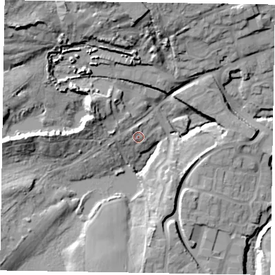 Shaded relief map of the ground around GU299QR, computed from Environment Agency LiDAR. The ground here sits at about 33 m above sea level and falls 29 m across the surrounding 800 m. Surface water reaching this point runs off ground lying to the west, 1.9 m higher.