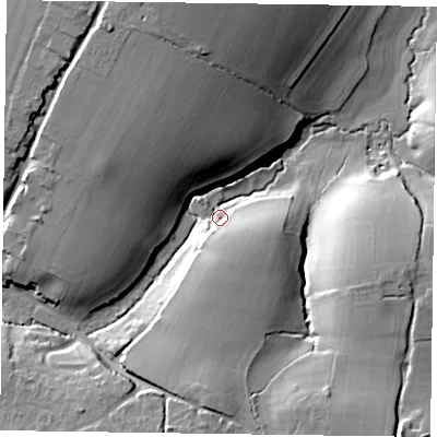 Shaded relief map of the ground around GU315LF, computed from Environment Agency LiDAR. The ground here sits at about 64 m above sea level and falls 31 m across the surrounding 800 m. Surface water reaching this point runs off ground lying to the south-south-east, 16.4 m higher.
