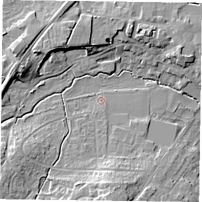 Shaded relief map of the ground around GU323PX, computed from Environment Agency LiDAR. The ground here sits at about 60 m above sea level and falls 15 m across the surrounding 800 m. Surface water reaching this point runs off ground lying to the south, 2.4 m higher.