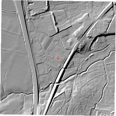 Shaded relief map of the ground around GU323QN, computed from Environment Agency LiDAR. The ground here sits at about 63 m above sea level and falls 13 m across the surrounding 800 m. Surface water reaching this point runs off ground lying to the north-east, 6.8 m higher.
