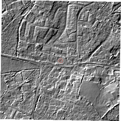 Shaded relief map of the ground around GU467RX, computed from Environment Agency LiDAR. The ground here sits at about 61 m above sea level and falls 14 m across the surrounding 800 m. Surface water reaching this point runs off ground lying to the south, 1.0 m higher.