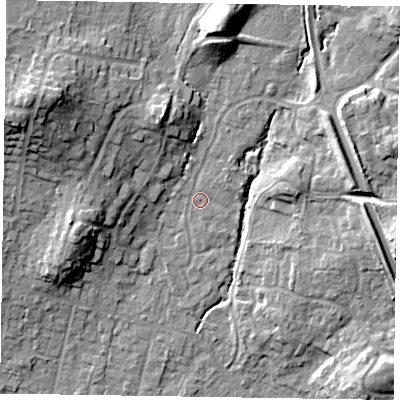 Shaded relief map of the ground around GU479RN, computed from Environment Agency LiDAR. The ground here sits at about 64 m above sea level and falls 21 m across the surrounding 800 m. Surface water reaching this point runs off ground lying to the west-north-west, 16.6 m higher.