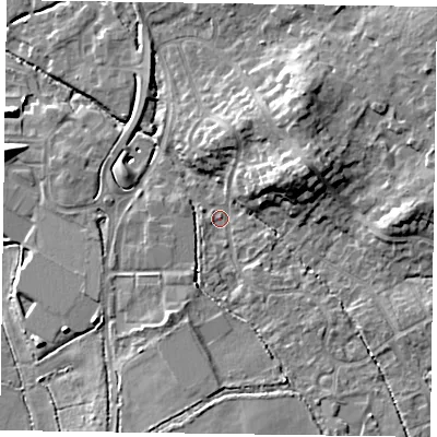 Shaded relief map of the ground around GU514EE, computed from Environment Agency LiDAR. The ground here sits at about 65 m above sea level and falls 13 m across the surrounding 800 m. Surface water reaching this point runs off ground lying to the east-north-east, 10.4 m higher.
