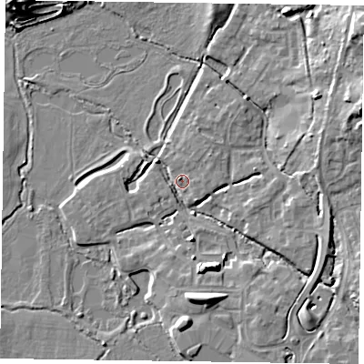 Shaded relief map of the ground around GU515BT, computed from Environment Agency LiDAR. The ground here sits at about 63 m above sea level and falls 11 m across the surrounding 800 m. Surface water reaching this point runs off ground lying to the south-south-east, 7.2 m higher.