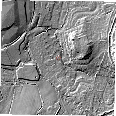 Shaded relief map of the ground around GU515TY, computed from Environment Agency LiDAR. The ground here sits at about 70 m above sea level and falls 16 m across the surrounding 800 m. Surface water reaching this point runs off ground lying to the east-north-east, 9.1 m higher.