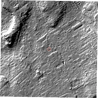 Shaded relief map of the ground around GU526AG, computed from Environment Agency LiDAR. The ground here sits at about 86 m above sea level and falls 16 m across the surrounding 800 m. Surface water reaching this point runs off ground lying to the south, 2.7 m higher.