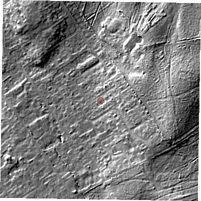 Shaded relief map of the ground around GU526BQ, computed from Environment Agency LiDAR. The ground here sits at about 87 m above sea level and falls 20 m across the surrounding 800 m. Surface water reaching this point runs off ground lying to the east, 7.7 m higher.