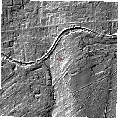 Shaded relief map of the ground around GU527LT, computed from Environment Agency LiDAR. The ground here sits at about 77 m above sea level and falls 13 m across the surrounding 800 m. Surface water reaching this point runs off ground lying to the south-south-east, 8.2 m higher.