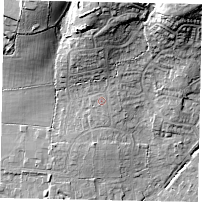 Shaded relief map of the ground around GU67AS, computed from Environment Agency LiDAR. The ground here sits at about 62 m above sea level and falls 25 m across the surrounding 800 m. Surface water reaching this point runs off ground lying to the north, 10.7 m higher.