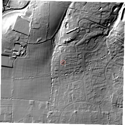 Shaded relief map of the ground around GU67AT, computed from Environment Agency LiDAR. The ground here sits at about 67 m above sea level and falls 27 m across the surrounding 800 m. Surface water reaching this point runs off ground lying to the north-north-east, 7.6 m higher.
