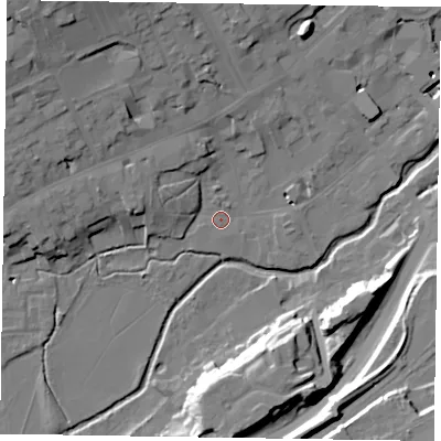 Shaded relief map of the ground around GU97PS, computed from Environment Agency LiDAR. The ground here sits at about 65 m above sea level and falls 22 m across the surrounding 800 m. Surface water reaching this point runs off ground lying to the north, 1.3 m higher.
