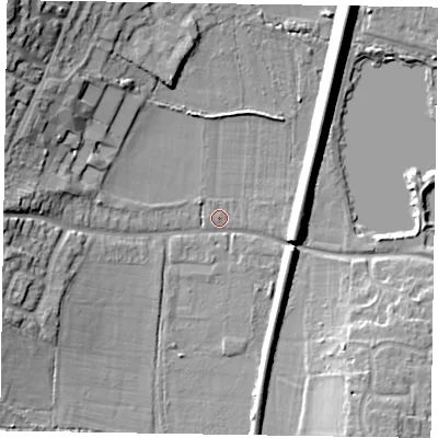 Shaded relief map of the ground around GU99HW, computed from Environment Agency LiDAR. The ground here sits at about 75 m above sea level and falls 18 m across the surrounding 800 m. Surface water reaching this point runs off ground lying to the west, 10.3 m higher.