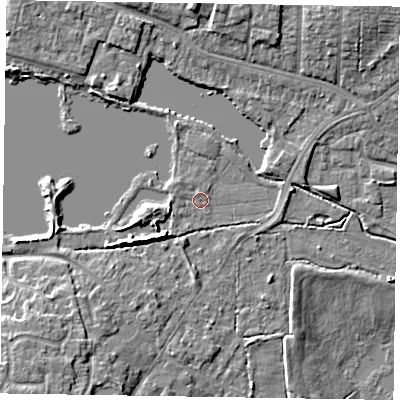 Shaded relief map of the ground around GU99LR, computed from Environment Agency LiDAR. The ground here sits at about 74 m above sea level and falls 11 m across the surrounding 800 m. Surface water reaching this point runs off ground lying to the west-south-west, 4.1 m higher.